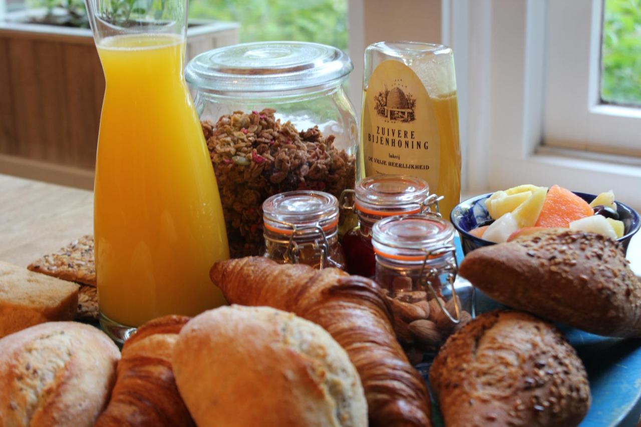 Bed and Breakfast Het Aambeeld Wanroij Esterno foto